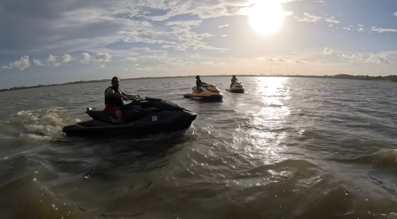 Jet ski riders on the water
